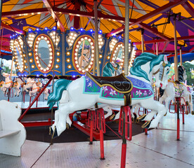 Carnival ride colorful carousel horse