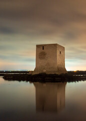 Sunset with a medieval tower in the background