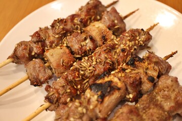 Northeastern Chinese cuisine: grilled lamb skewers with cumin seeds