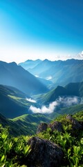 Fototapeta premium Vast mountain range stretching across the horizon, with detailed rock formations and mist in the valleys Soft natural lighting, panoramic view, deep blue sky