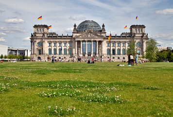 Berlin, Germany, July 29 2009, Visitors Enjoy a Sunny Day Outside the Reichstag Building in Berlin