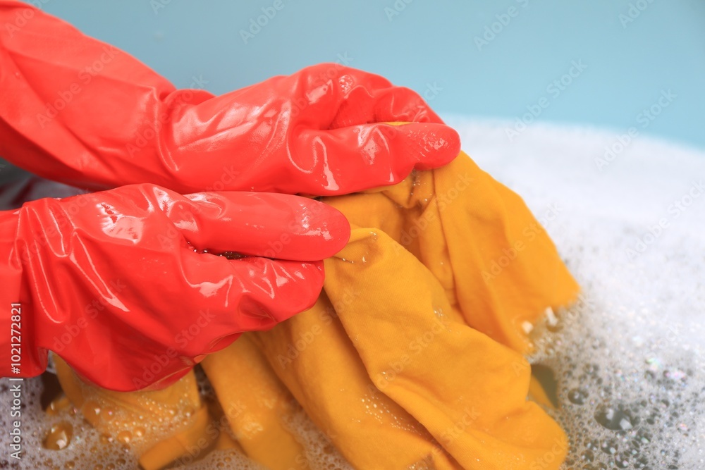 Poster Woman washing garment in basin, closeup. Laundry