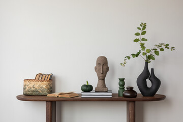 Clean, organized console table featuring natural tones and organic shapes, creating a calm and...