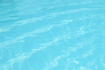 Clear water in outdoor swimming pool on sunny day