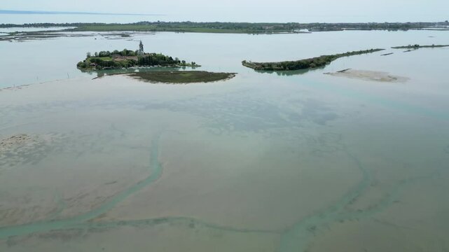 Grado Lagoon seen from above. Between waters, islands and uncontaminated nature