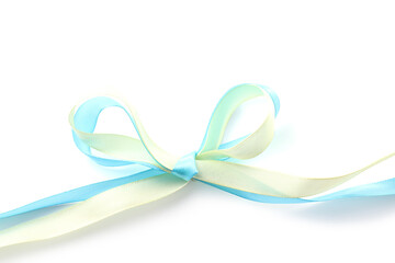 Bow in colors of Ukrainian national flag isolated on white, top view