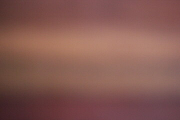 A vague brown background with room for text.