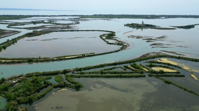 Grado Lagoon seen from above. Between waters, islands and uncontaminated nature
