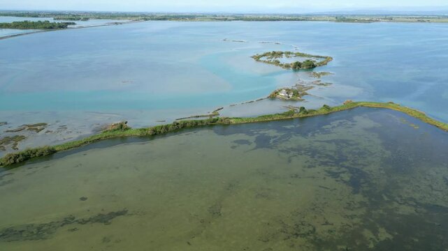 Grado Lagoon seen from above. Between waters, islands and uncontaminated nature