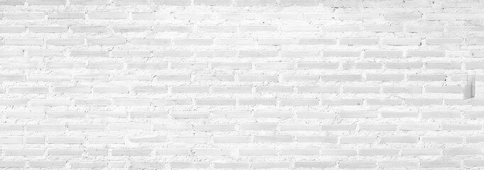 White brick wall texture with clean lines, minimalistic design, perfect for backgrounds or architectural projects.