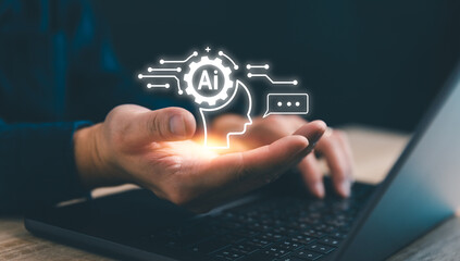 Man use intelligent AI technology on laptop, AI(Artificial intelligence) concept, Chat with Chatbot for asking information or generative content, Internet of things, AI and business IOT.