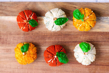 Pumpkin-Shaped Cheese Balls with Spices.selective focus