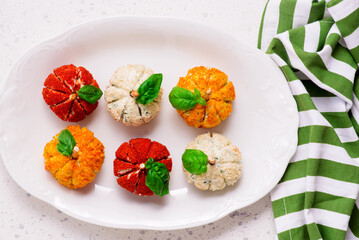 Pumpkin-Shaped Cheese Balls with Spices.selective focus
