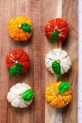 Pumpkin-Shaped Cheese Balls with Spices.selective focus