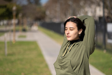 Young woman doing stretching exercise