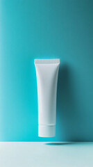 White cosmetic tube mockup on color background, minimalist display concept