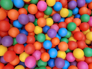 Many color plastic balls background.