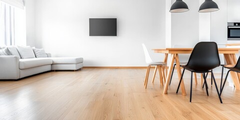 An airy Scandinavian living room and dining area with minimalist furniture, including a soft white sofa and a wooden dining table with mismatched chairs, creating a relaxed atmosphere