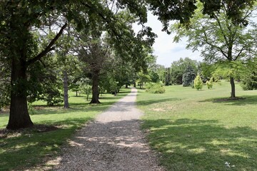 The long empty gravel path in the countryside.