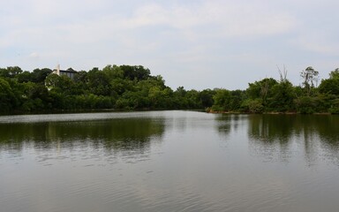 The peaceful lake in the country on a sunny day.