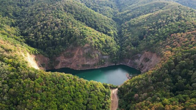Drone aerial view of lake with hills