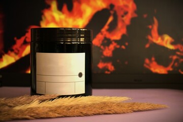 cozy autumn winter candle with fire background