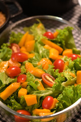 healthy food plate with tropical salad greens vegetables seasoned salad vegan lunch tomato and onion