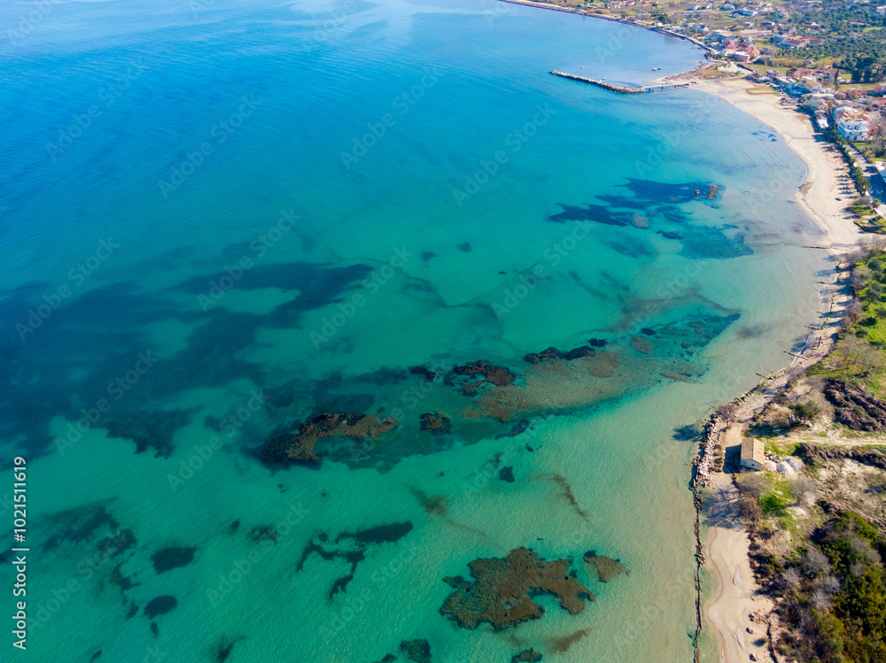 Wall mural background image of the turquoise sea. deep sea and corals. aerial drone shot of turquoise water.