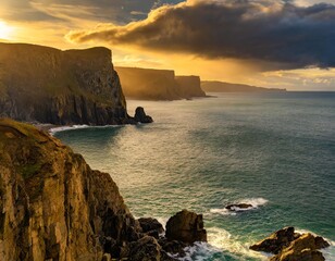 Golden Light of Sunset Over a Rocky Seashore With Towering Cliffs and Crystal Clear Ocean Waters,...