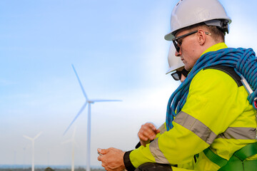 Several pigs are staying in a pen in a warehouse with cages.