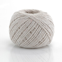 Ball of string on white