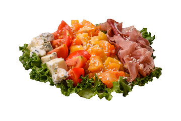 Appetizing salad with prosciutto, pumpkin, cheese and tomatoes