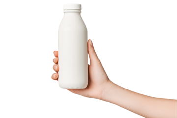 Hand holding a glass bottle of milk isolated on white background. Concept of dairy product and healthy living.
