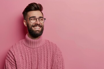 Obraz premium Confident young man with beard and glasses smiling happily