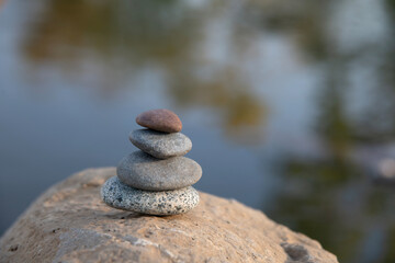 Mindful lake with balancing stones