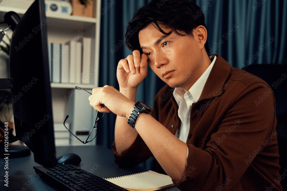 Poster working businessman feeling extremely tired with sleepy while working on desk with unfinish project 