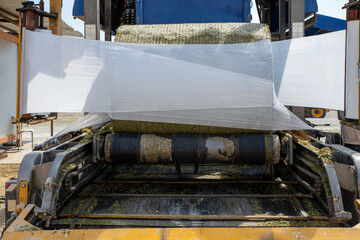 Industrial feed bale making machine