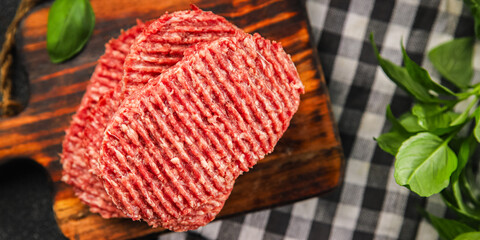 Meat cutlet raw fresh ground beef burger, pork, chicken, turkey dish fresh delicious gourmet food background on the table rustic food top view copy space