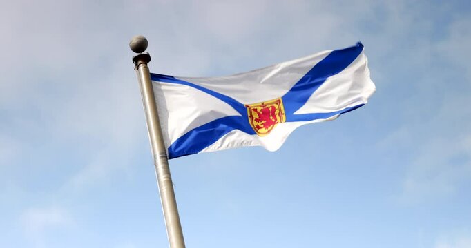 Nova Scotia Canada provincial flag flying in the wind