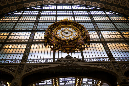 famous clock in Musee d'Orsay impressionist gallery in Paris, France
