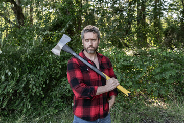 Lumberjack hardworking outdoor. Brutal lumberjack. Brutality and masculinity. Hispanic lumberjack...