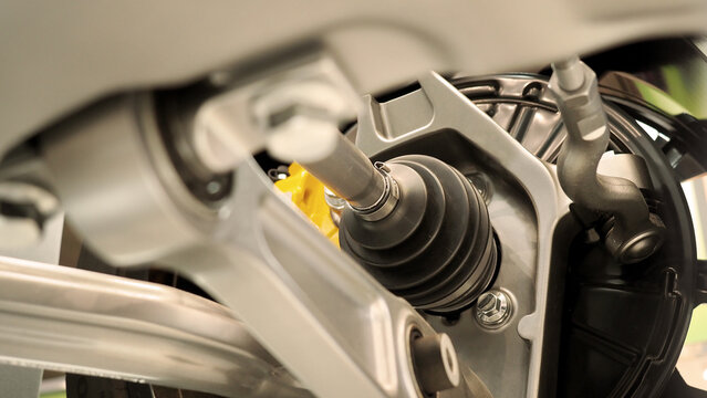 Car suspension and drive shaft. Structure of EV car spare parts. Such as Front or Rear suspension Shock absorber suspension Brake. Elements of the suspension and Chassis structure. Car service repair.