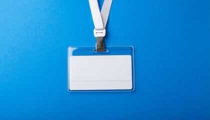 Blank office badge, empty name tag on bright blue backdrop. Mock-up.