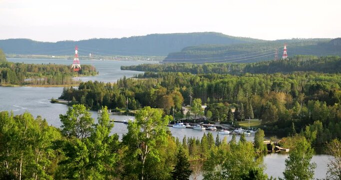 The pristine Nipigon River winds through the rugged wilderness of Northern Ontario, surrounded by dense forests and untouched natural beauty