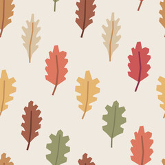 Seamless pattern of colorful autumn oak leaves in cutout style on light beige background. Simple geometric botanical elements. Fall vector design for textile, wallpaper, wrapping paper.