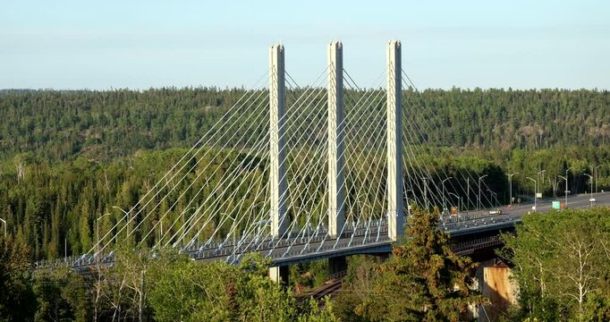 The Nipigon River Bridge spans the scenic wilderness of Northern Ontario, offering stunning views of the river and surrounding natural landscape