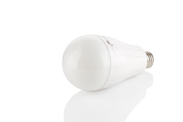 LED light bulb with dual power supply AC - DC 18650 battery isolated on white background. Energy saving electric lamp is good for ecology.
