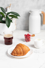 freshly baked golden French croissant