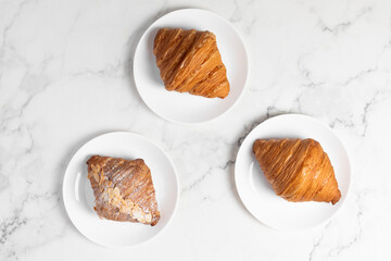freshly baked golden french croissants