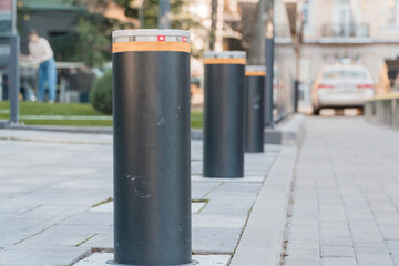 Urban Security Bollards in a Modern Cityscape